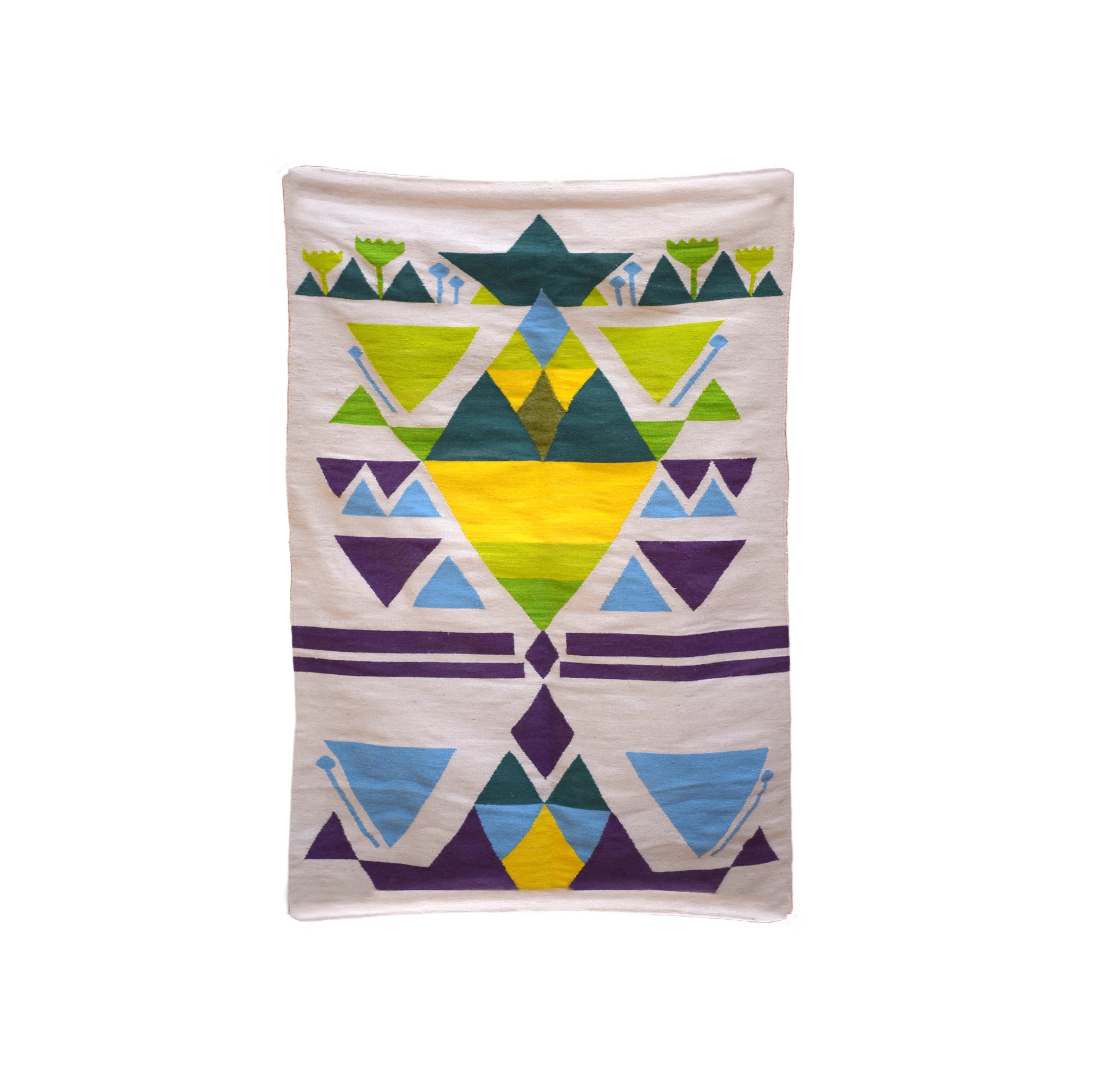"A full view of a woven rug featuring geometric patterns in green, yellow, blue, and purple on a light beige background."